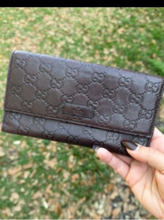 Gucci Handbags - Gucci Dark Brown Embossed GG Fold Wallet